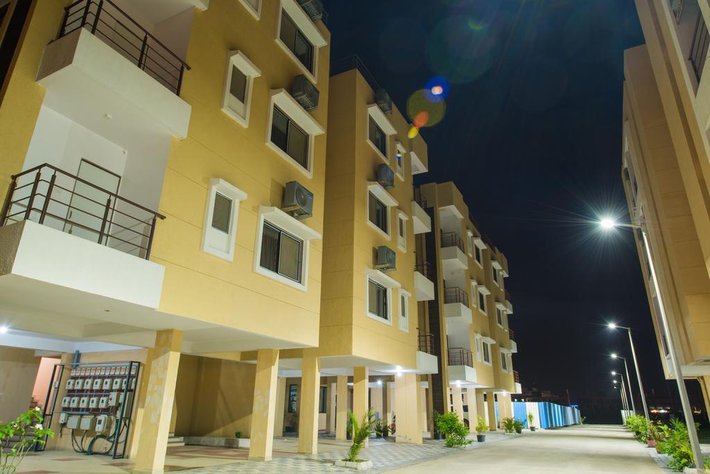 Budget Inn Service Apartments - Tiger Plaza Vengni Exterior photo