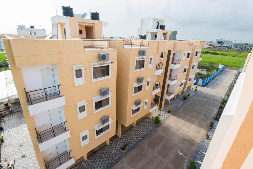 Budget Inn Service Apartments - Tiger Plaza Vengni Exterior photo