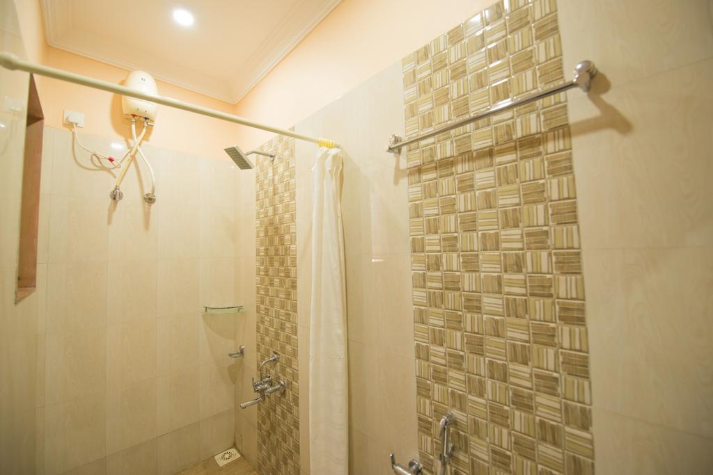 Budget Inn Service Apartments - Tiger Plaza Vengni Room photo