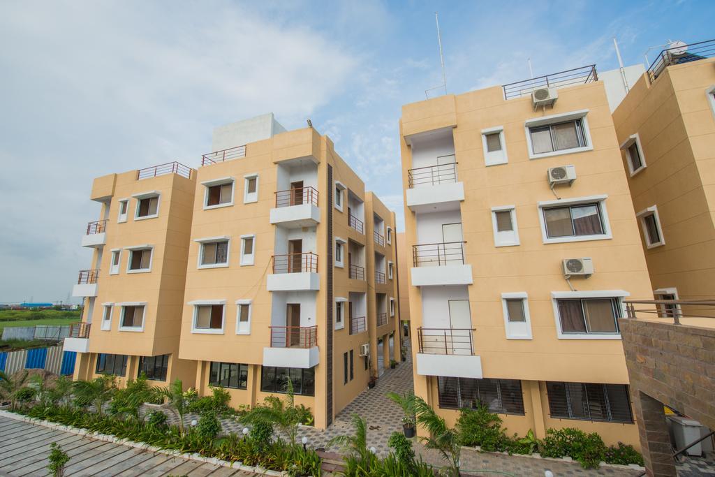 Budget Inn Service Apartments - Tiger Plaza Vengni Exterior photo