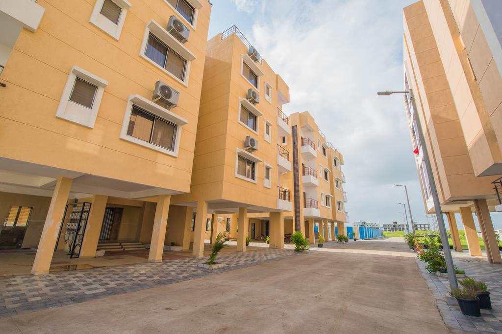 Budget Inn Service Apartments - Tiger Plaza Vengni Exterior photo