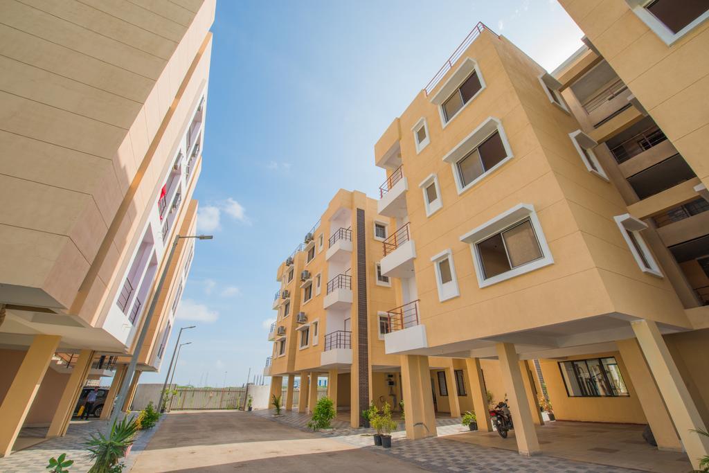 Budget Inn Service Apartments - Tiger Plaza Vengni Exterior photo